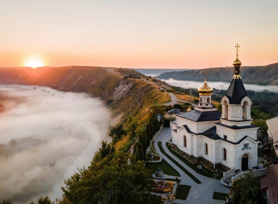 aerial-drone-panorama-view-old-orhei-sunset-valley-with-river-fog-village_1268-18946